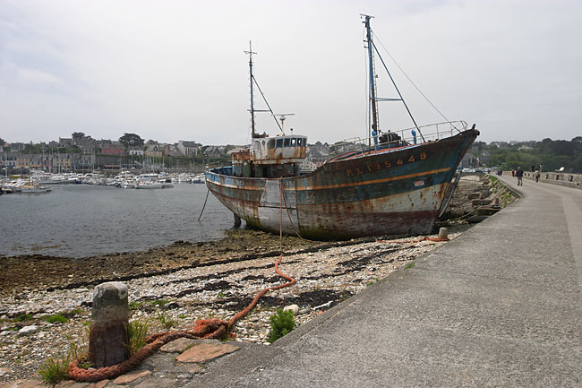 Fishing boat lying high and dry