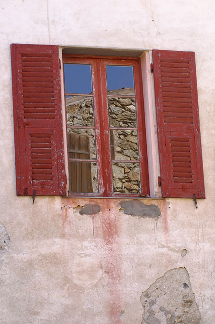 Red window on an old house