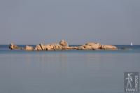 Sailboat and rocks