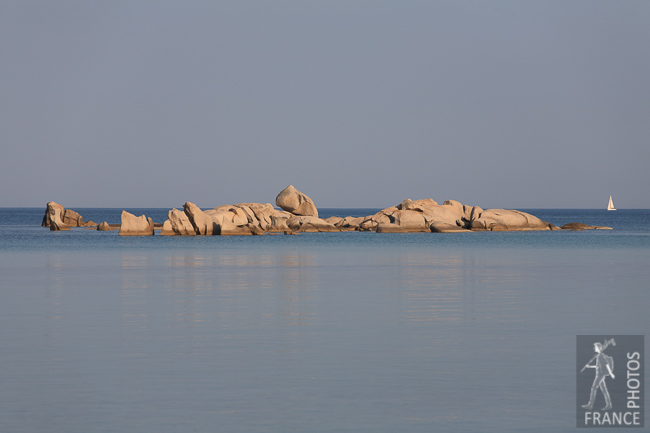 Sailboat and rocks