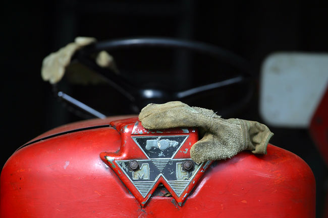 Red tractor and glove