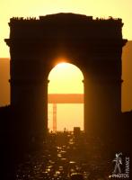 Sun under the Arc de Triomphe