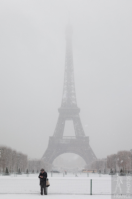 Snow falls on the tower