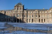 Louvre inner courtyard in snow