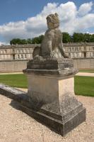 Guardian dog at the entrance of the Chantilly park